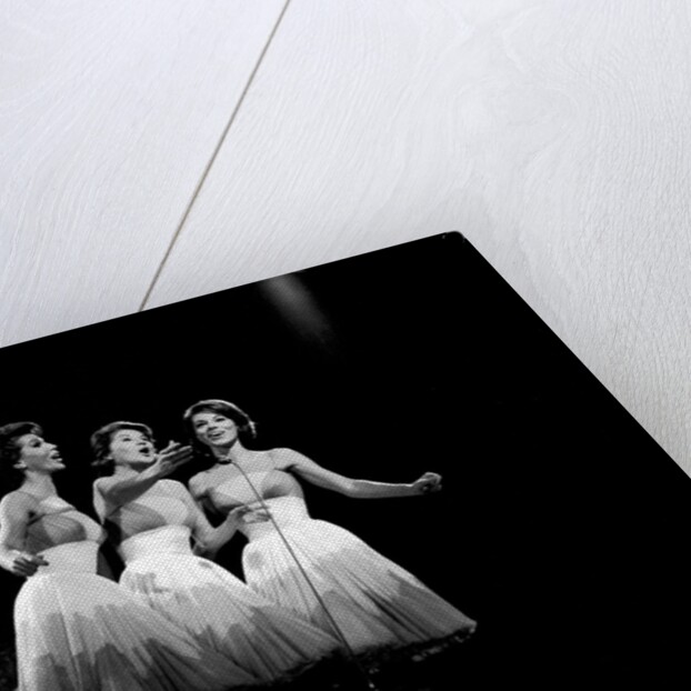 The McGuire Sisters, a singing trio in American popular music by Harry Hammond