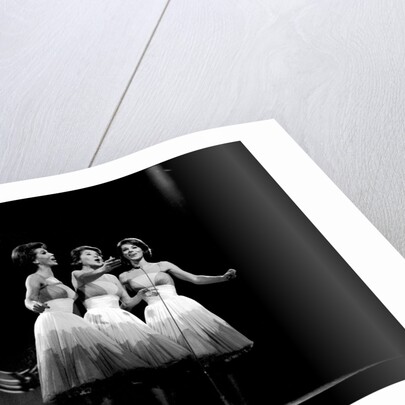 The McGuire Sisters, a singing trio in American popular music by Harry Hammond
