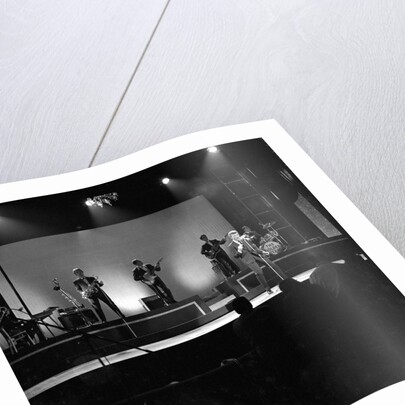 Johnny Hallyday with band performing on the Palladium Stage by Harry Hammond