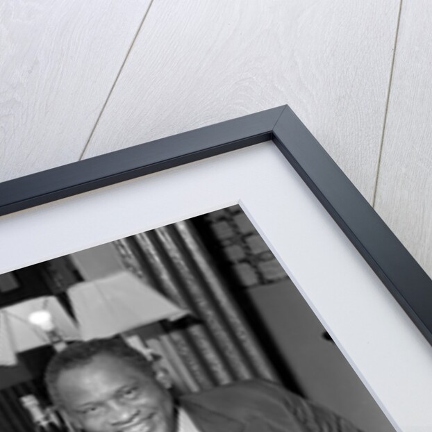 Paul Robeson with Eve Boswell in the Palladium dressing room by Harry Hammond