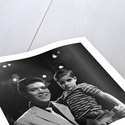 Cliff Richard with a young fan by Harry Hammond