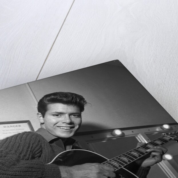 Cliff Richard with guitar by Harry Hammond