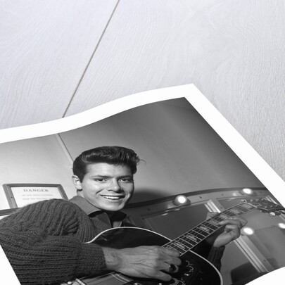 Cliff Richard with guitar by Harry Hammond