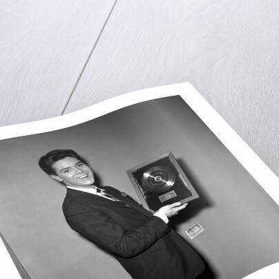 Cliff Richard with his first gold record by Harry Hammond