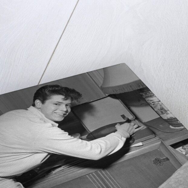 Cliff Richard playing records by Harry Hammond