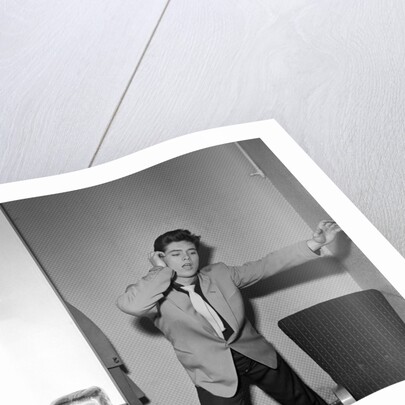 Cliff Richard rehearsing in a dressing room by Harry Hammond