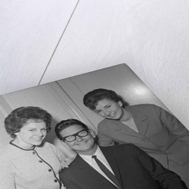 Roy Orbison posing with two fans by Harry Hammond