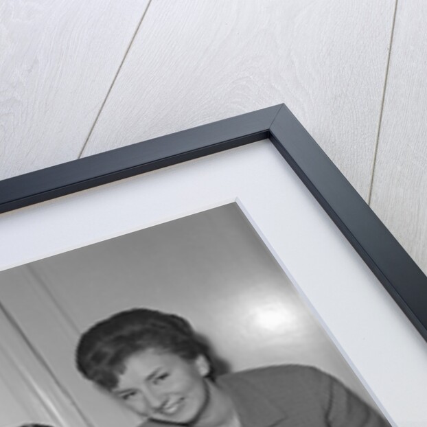 Roy Orbison posing with two fans by Harry Hammond