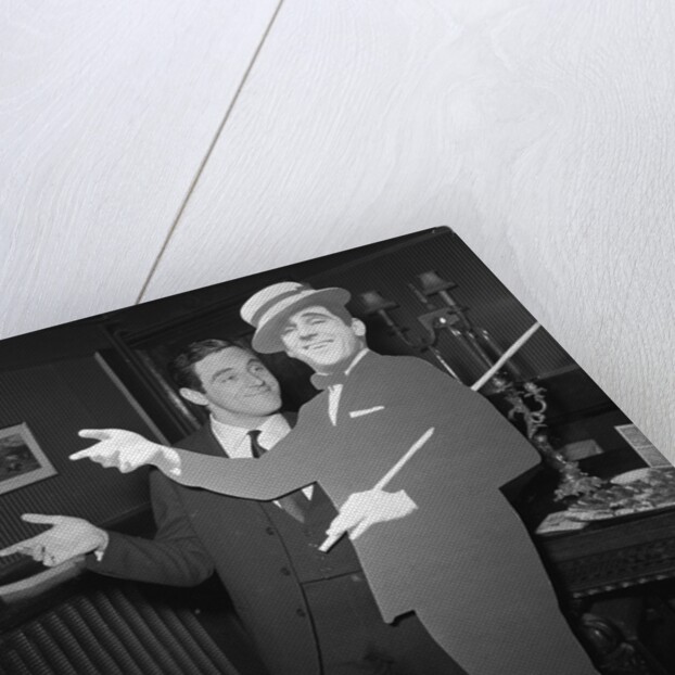 Anthony Newley with cardboard cut-out of himself by Harry Hammond