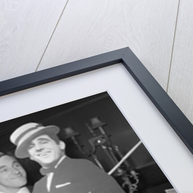 Anthony Newley with cardboard cut-out of himself by Harry Hammond