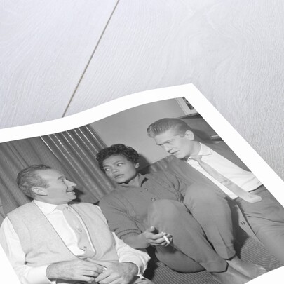 Eartha Kitt with two unnamed men by Harry Hammond