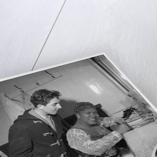 Sister Rosetta Tharp with unknown man in her dressing room by Harry Hammond