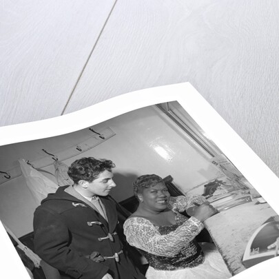 Sister Rosetta Tharp with unknown man in her dressing room by Harry Hammond