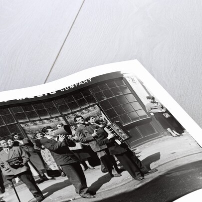 Danny Purches with a group of people by Harry Hammond