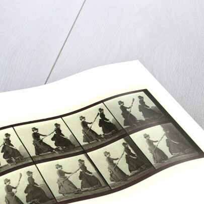 Women chasing another woman with a broom by Eadweard Muybridge