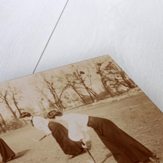 Four ladies playing hockey by Andrew Pitcairn-Knowles