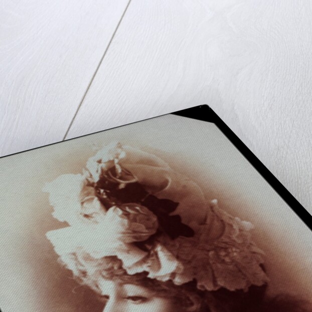 Belle Bilton wearing an ornate hat by Alexander Bassano