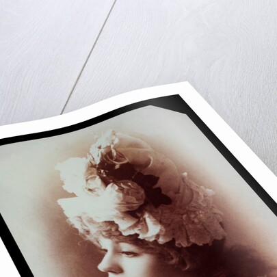 Belle Bilton wearing an ornate hat by Alexander Bassano