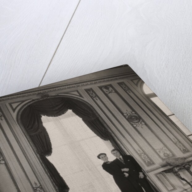 The Duke and Duchess of Windsor posing against a large window by Cecil Beaton