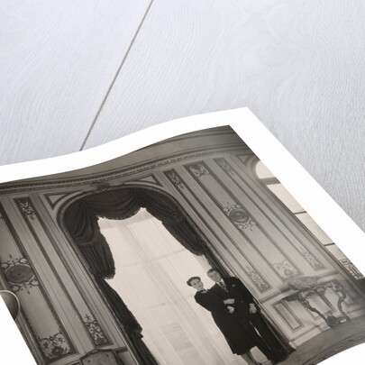 The Duke and Duchess of Windsor posing against a large window by Cecil Beaton