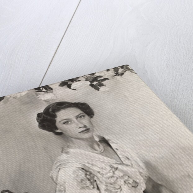 Princess Margaret sitting on a chair by Cecil Beaton