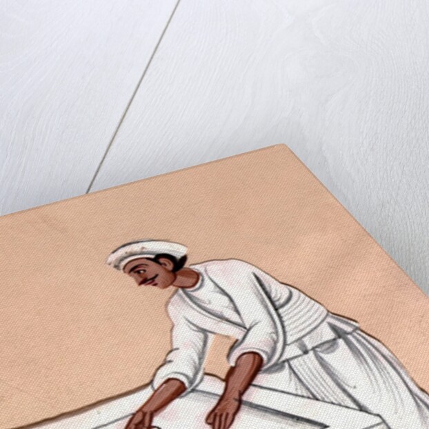 A dhobi ironing by Unknown