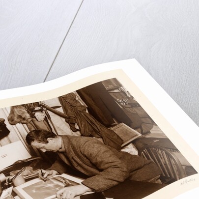Dr. Edward Adrian Wilson colouring a sketch by Herbert George Ponting