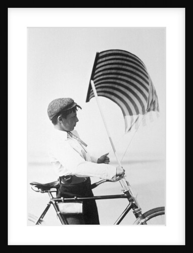 Adjusting the sail on the bike by Andrew Pitcairn-Knowles