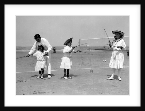 Man and Three Children, Diabolo over a net by Andrew Pitcairn-Knowles