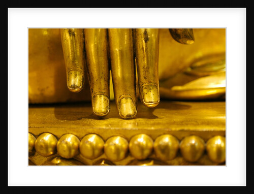 Hand of a seated Buddha by Stuart Cox