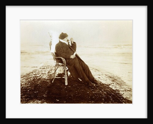 Man Sitting in Chair on Groyne by Andrew Pitcairn-Knowles