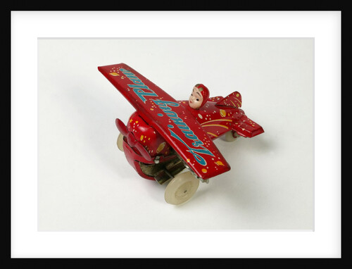 Clockwork toy airplane by Unknown