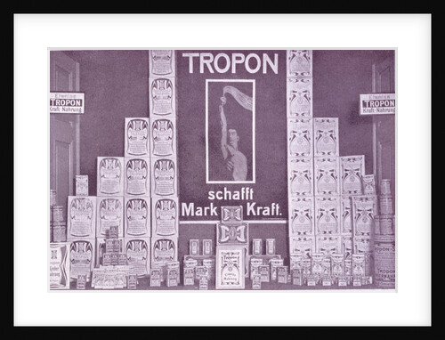 Photograph of a shop window with a display of Tropon goods by Anonymous