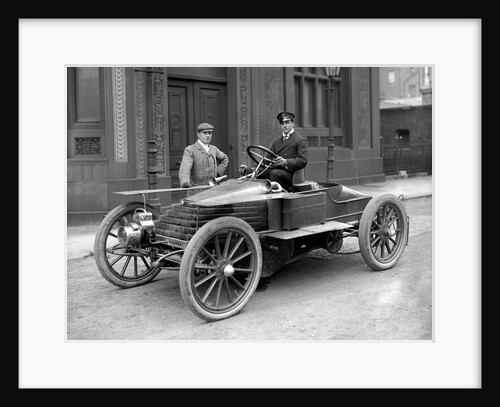 Graham White in racing car by Lafayette Portrait Studios