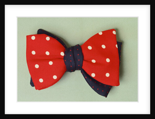 Two contrasting bow ties with poker dot pattern by Turnbull and Asser Ltd.