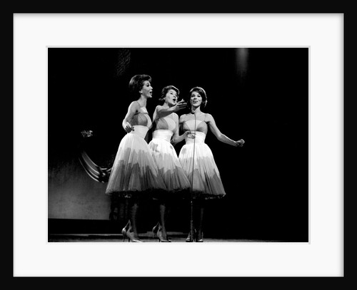 The McGuire Sisters, a singing trio in American popular music by Harry Hammond