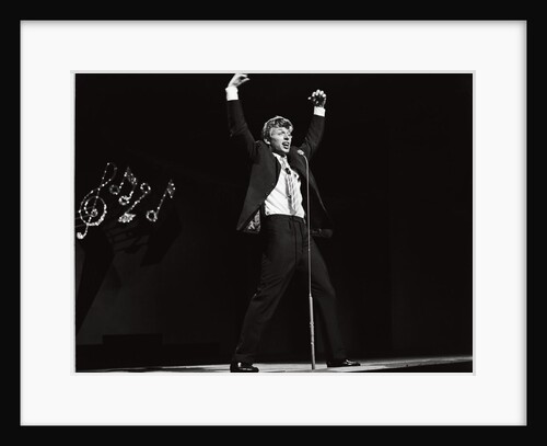 Tommy Steele performing on stage by Harry Hammond