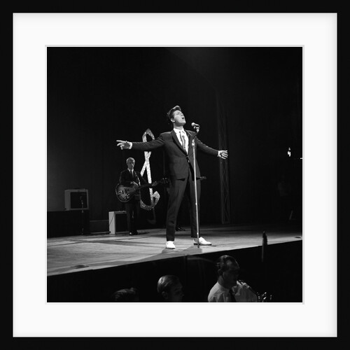 Cliff Richard performing on stage by Harry Hammond