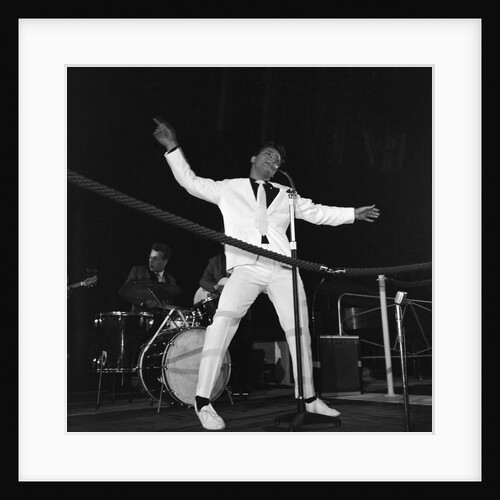 Cliff Richard performing on stage by Harry Hammond