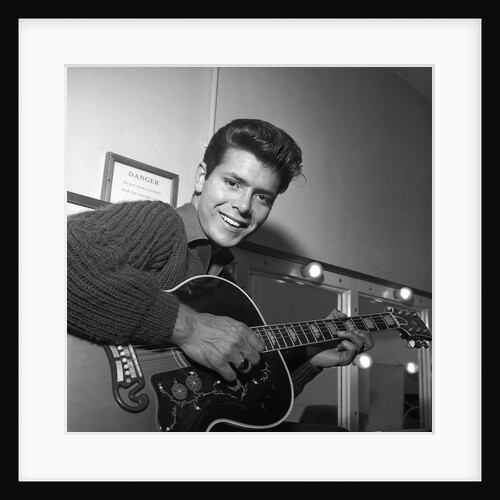 Cliff Richard with guitar by Harry Hammond