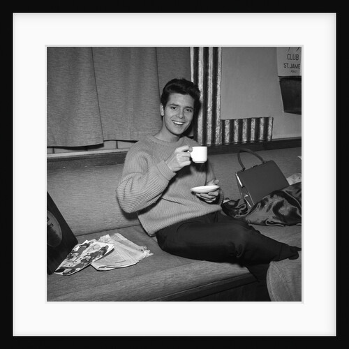 Cliff Richard having a cup of tea by Harry Hammond