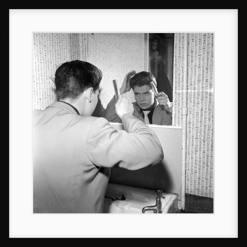 Cliff Richard combing his hair by Harry Hammond