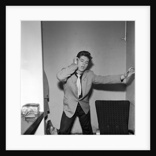 Cliff Richard rehearsing in a dressing room by Harry Hammond