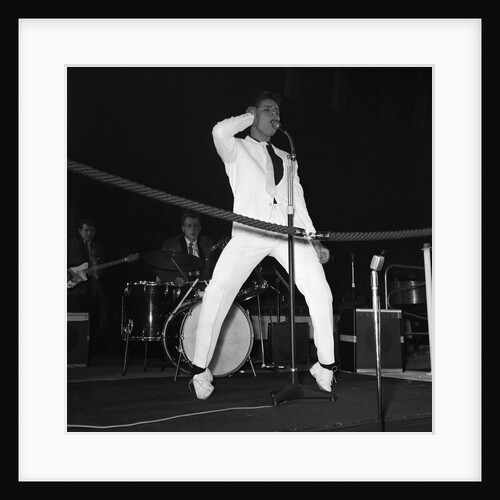 Cliff Richard performing on stage by Harry Hammond