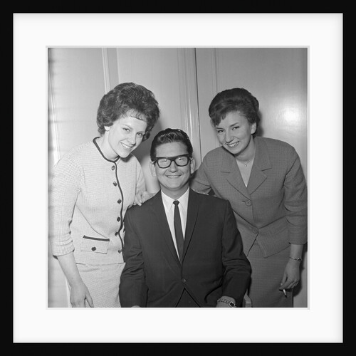 Roy Orbison posing with two fans by Harry Hammond