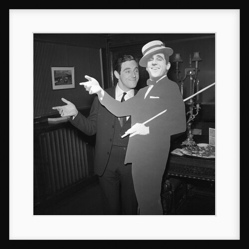 Anthony Newley with cardboard cut-out of himself by Harry Hammond
