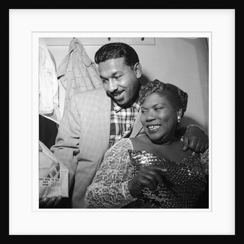 Sister Rosetta Tharp with unknown man in her dressing room by Harry Hammond