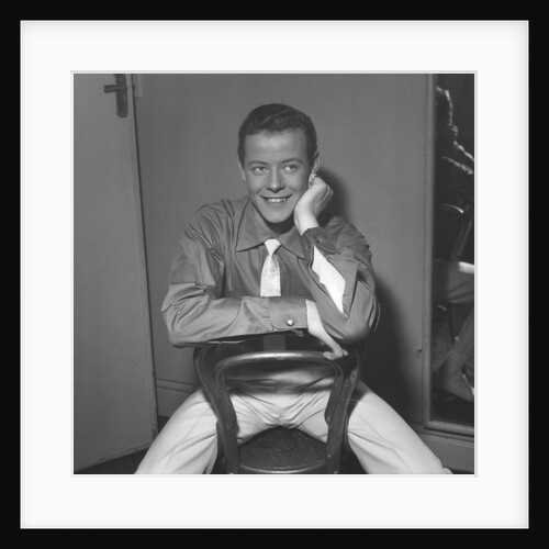 Craig Douglas sitting on a chair by Harry Hammond