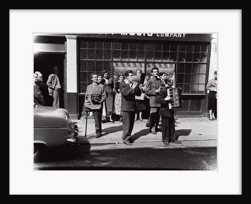 Danny Purches with a group of people by Harry Hammond