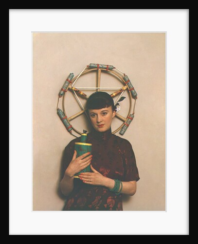 Woman in eastern dress with fireworks by Curtis Moffat